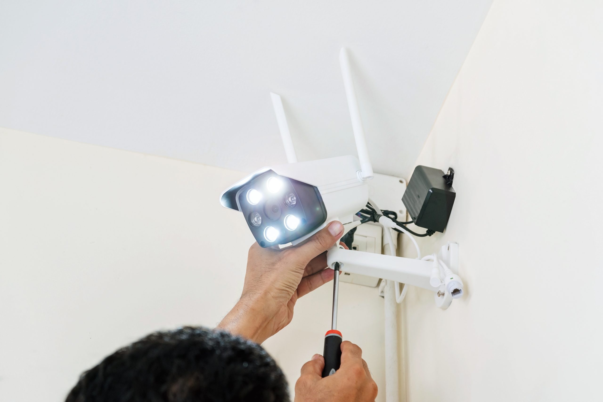technicians-are-installing-wireless-cctv-cameras-2021-08-30-21-43-31-utc